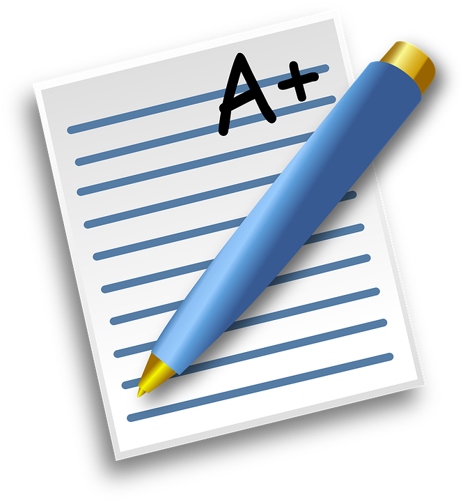 Image result for teacher grading papers on a computer