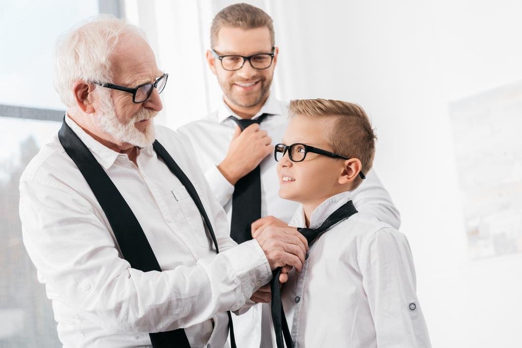 stock-photo-grandfather-helping-grandson-with-tie.jpg