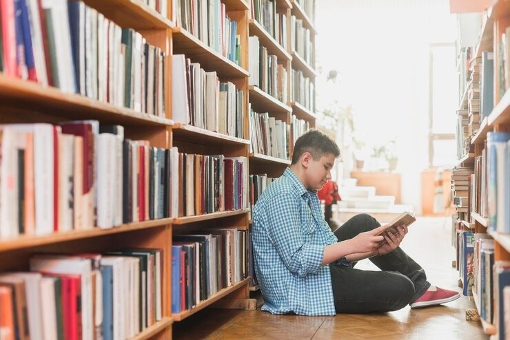 teenager-reading-bookshelves_23.jpg