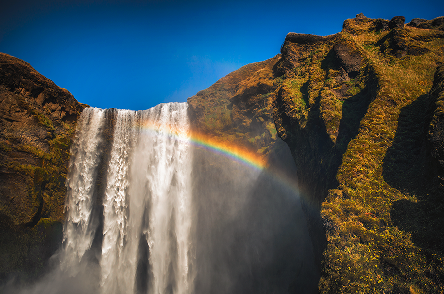 crimsonclad-iceland-skogafoss-rainbows-expectations-3.png