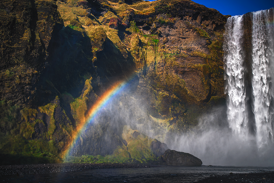 crimsonclad-iceland-skogafoss-rainbows-expectations-4.png