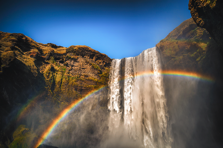 crimsonclad-iceland-skogafoss-rainbows-expectations-2.png