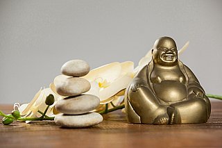 laughing-buddha-figurine-with-pebbles-stone-flower-(2)-small.jpg