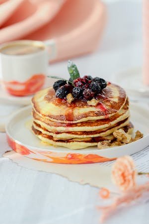 free-photo-of-pancakes-with-berries-and-marple-syrup.jpeg