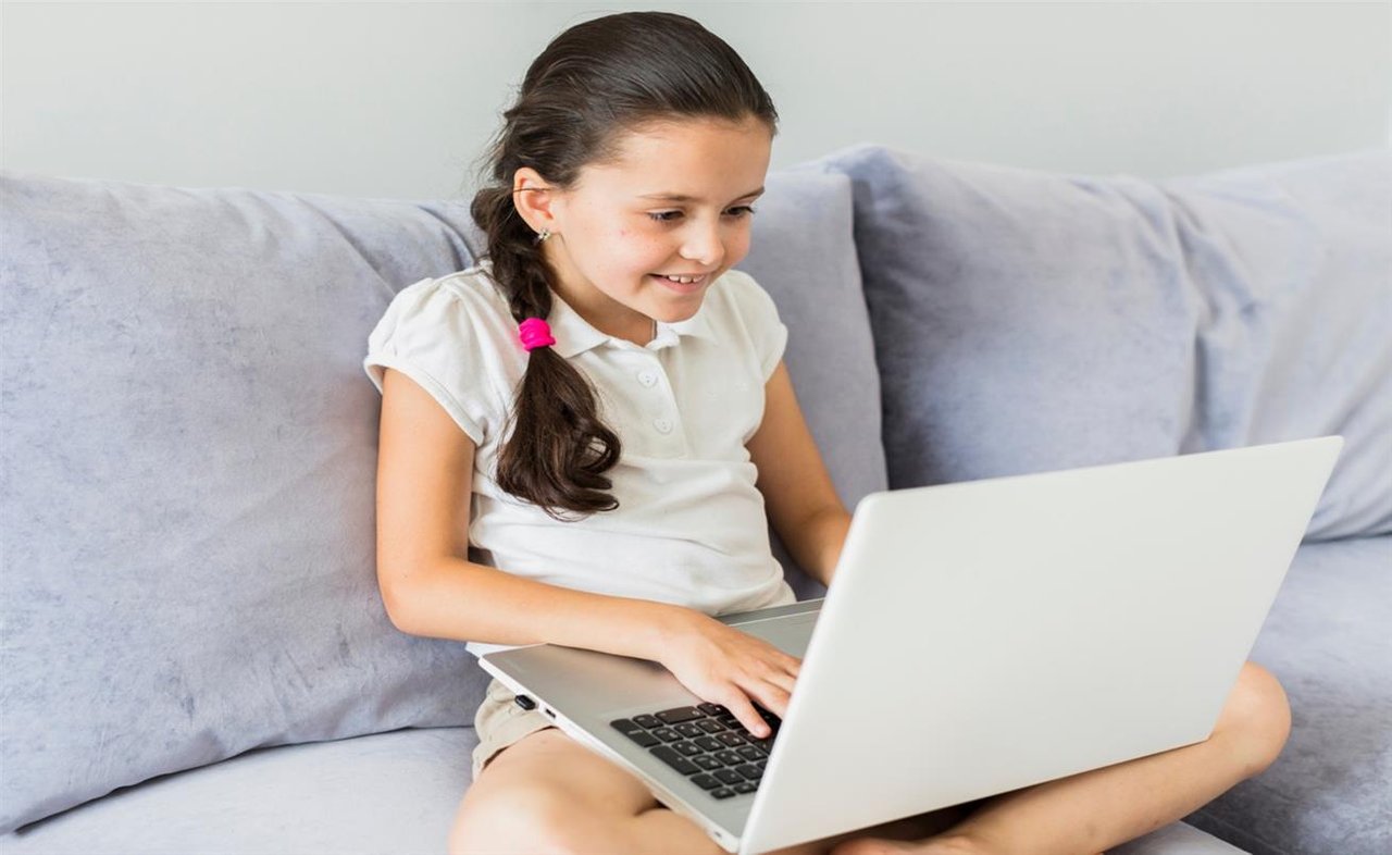 lovely-little-girls-using-her-laptop.jpg