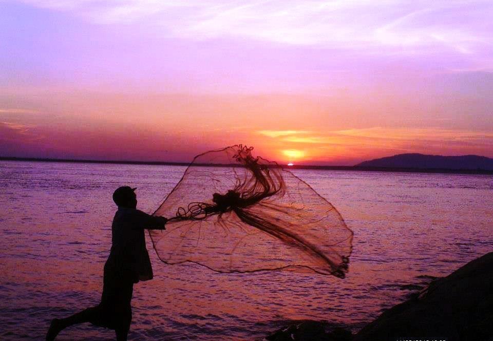 Pescando Solitario con el atardecer.jpg