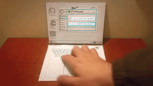 stop-motion-animation-of-a-man-using-a-laptop-made-entirely-of-paper.gif