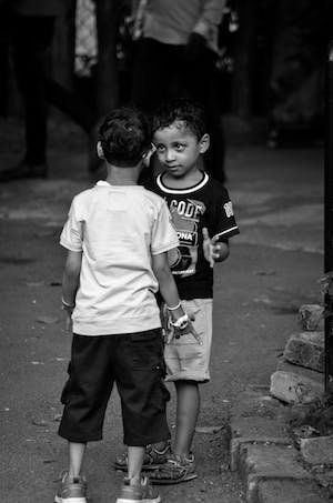 free-photo-of-children-on-a-field-in-black-and-white.jpeg