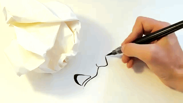 london-artist-draws-faces-from-the-shadow-of-a-crumpled-up-piece-of-paper.gif