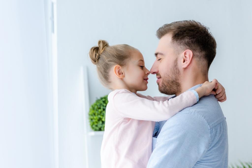 stock-photo-father-child-girl-embracing-touching.jpg