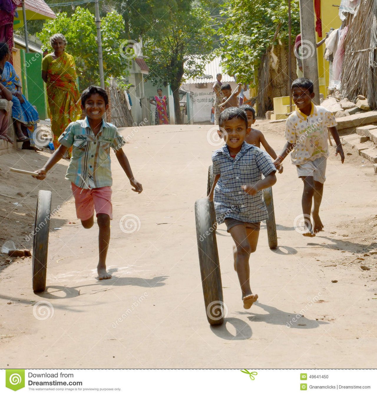 happy-poverty-children-little-boys-playing-wheel-remote-village-tamilnadu-india-photo-taken-january-th-49641450.jpg