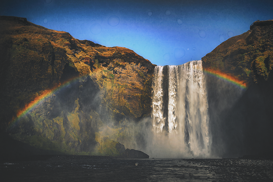 crimsonclad-iceland-skogafoss-rainbows-expectations-5.png