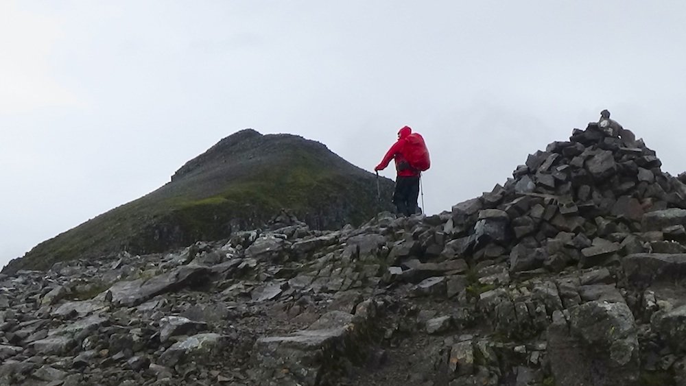 22 Sandy soaked to the skin on the way up to Bidean summit.jpg