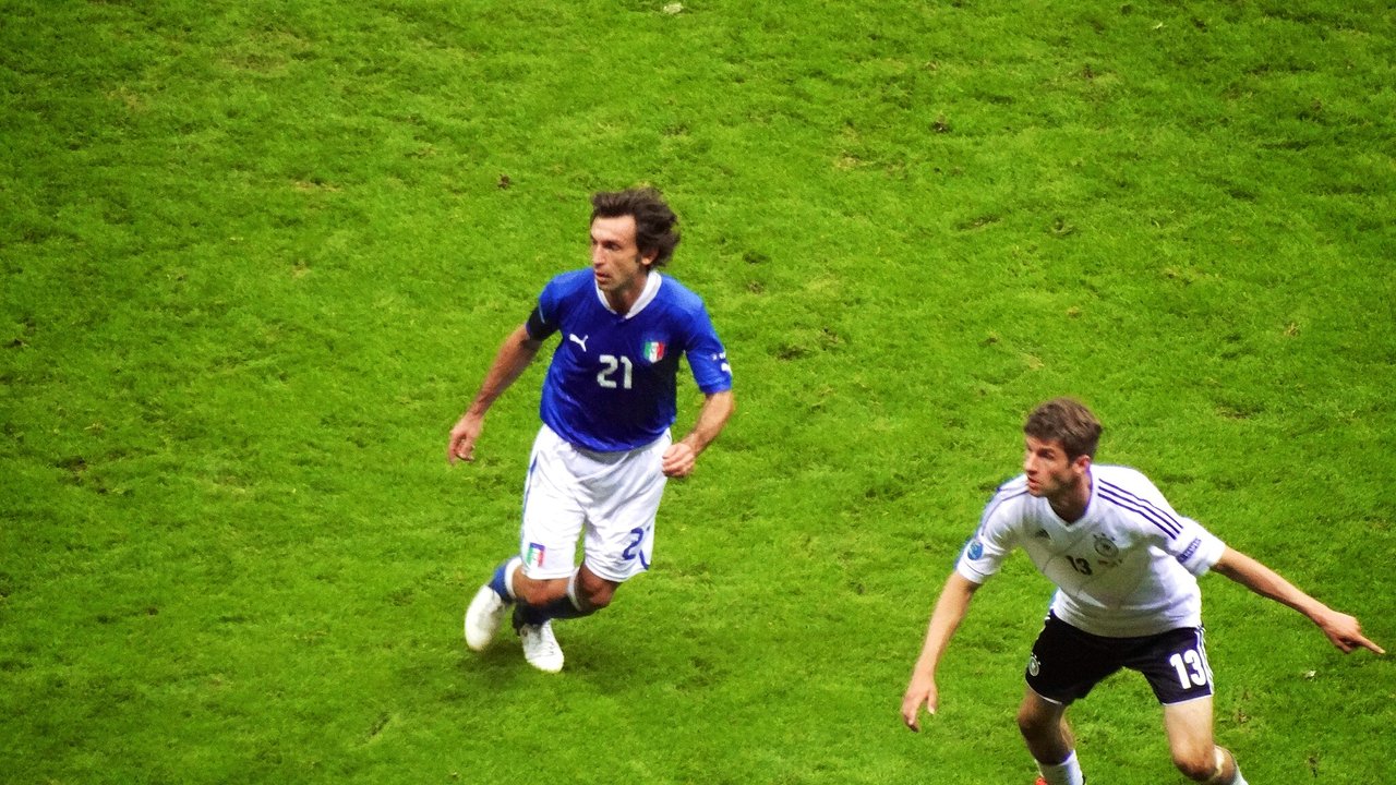 2048px-Pirlo_and_Müller_-_Euro_2012.jpg