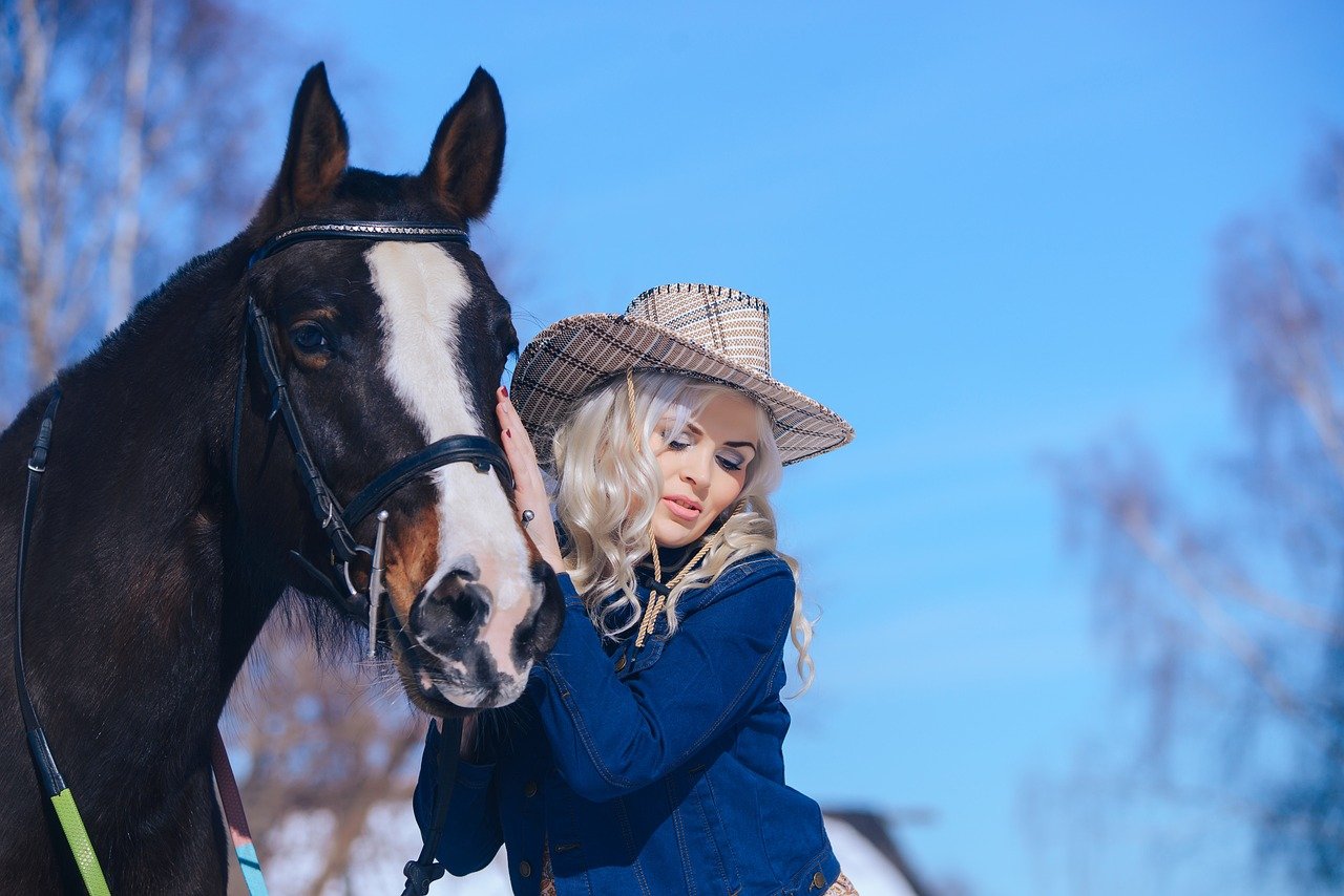 blonde-with-a-horse-4597135_1280.jpg