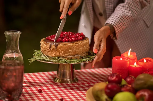 side-view-woman-cutting-cake_23-2149655637.webp