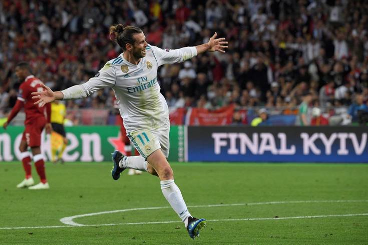 203209347-real-madrid27s-welsh-forward-gareth-bale-celebrates-after-scoring-his-second-goal-during-th.jpg