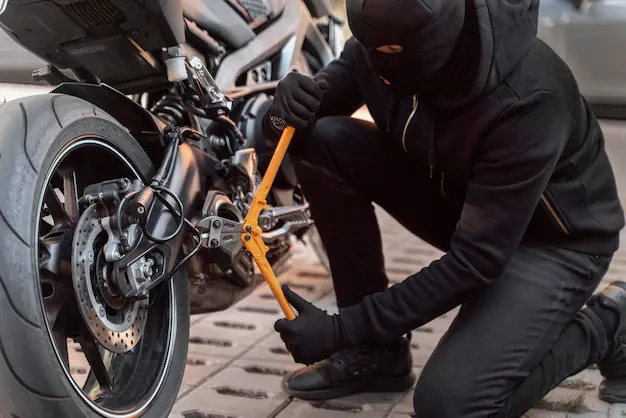 close-up-man-preparing-steal-motorcycle_23-2149133037.webp