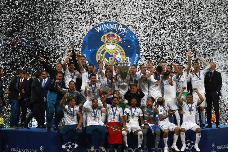 203210969-real-madrid-players-celebrate-with-trophy-after-winning-the-champions-league-final-soccer.jpg