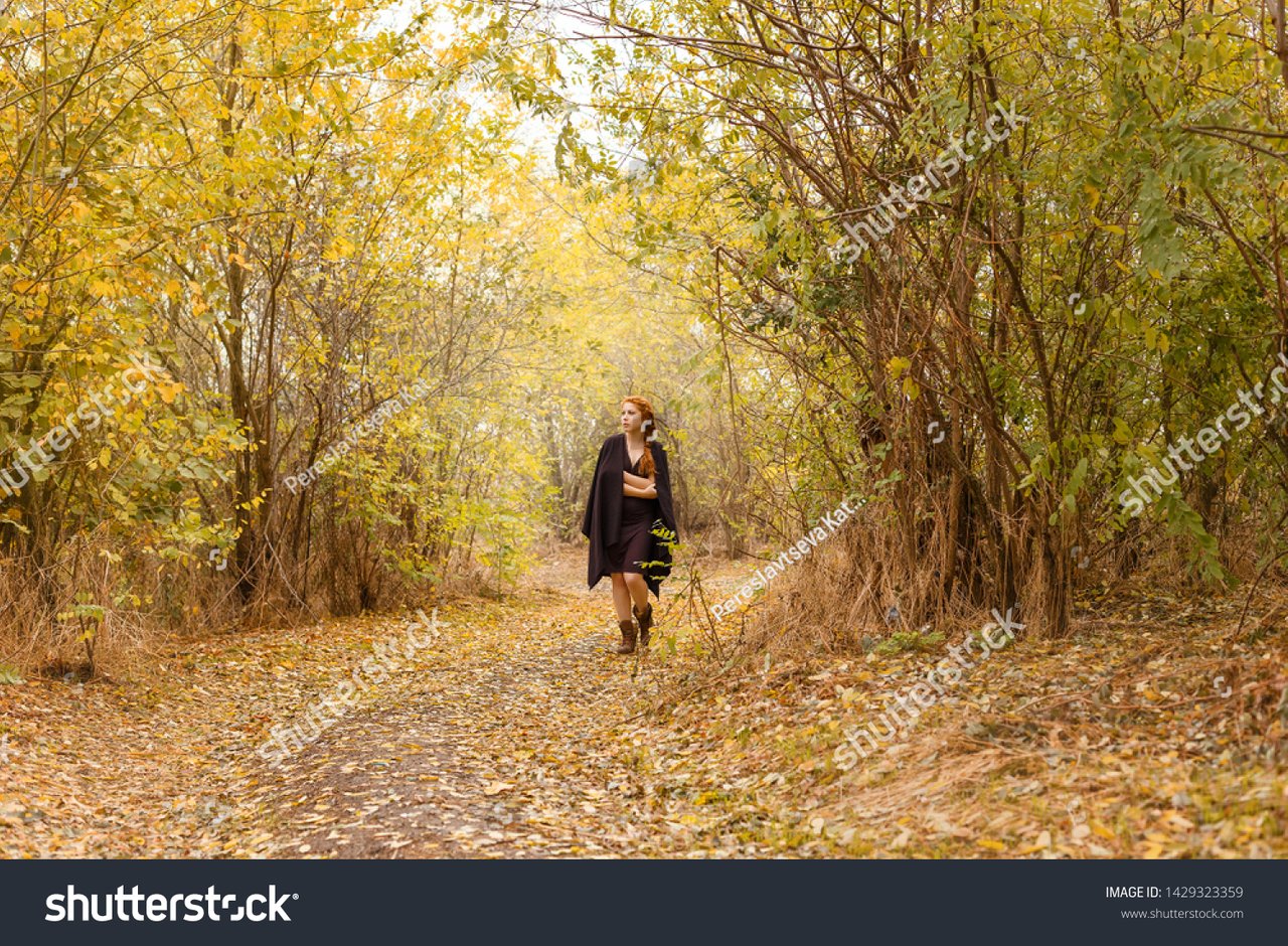 stock-photo-sweet-girl-in-the-autumn-forest-loneliness-and-melancholy-1429323359.jpg