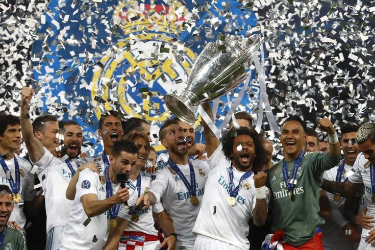 203211722-real-madrid-players-celebrate-with-the-trophy-after-winning-the-champions-league-final-soc.jpg