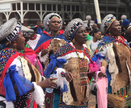 Dancers Strutting Their Cultural Dress Dancers Strutting Their Cultural Dress