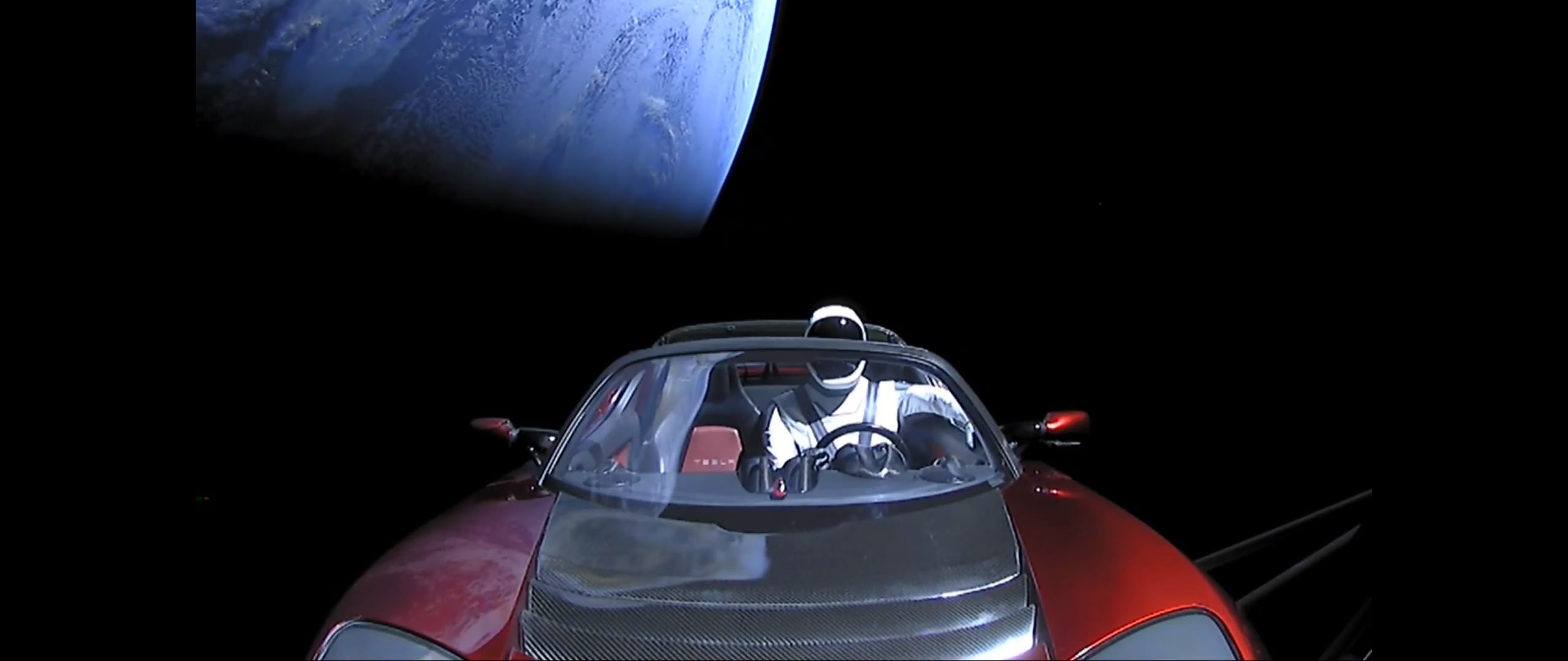 Now We Have Our Starman Sitting Inside His Tesla Roadster Now We Have Our Starman Sitting Inside His Tesla Roadster