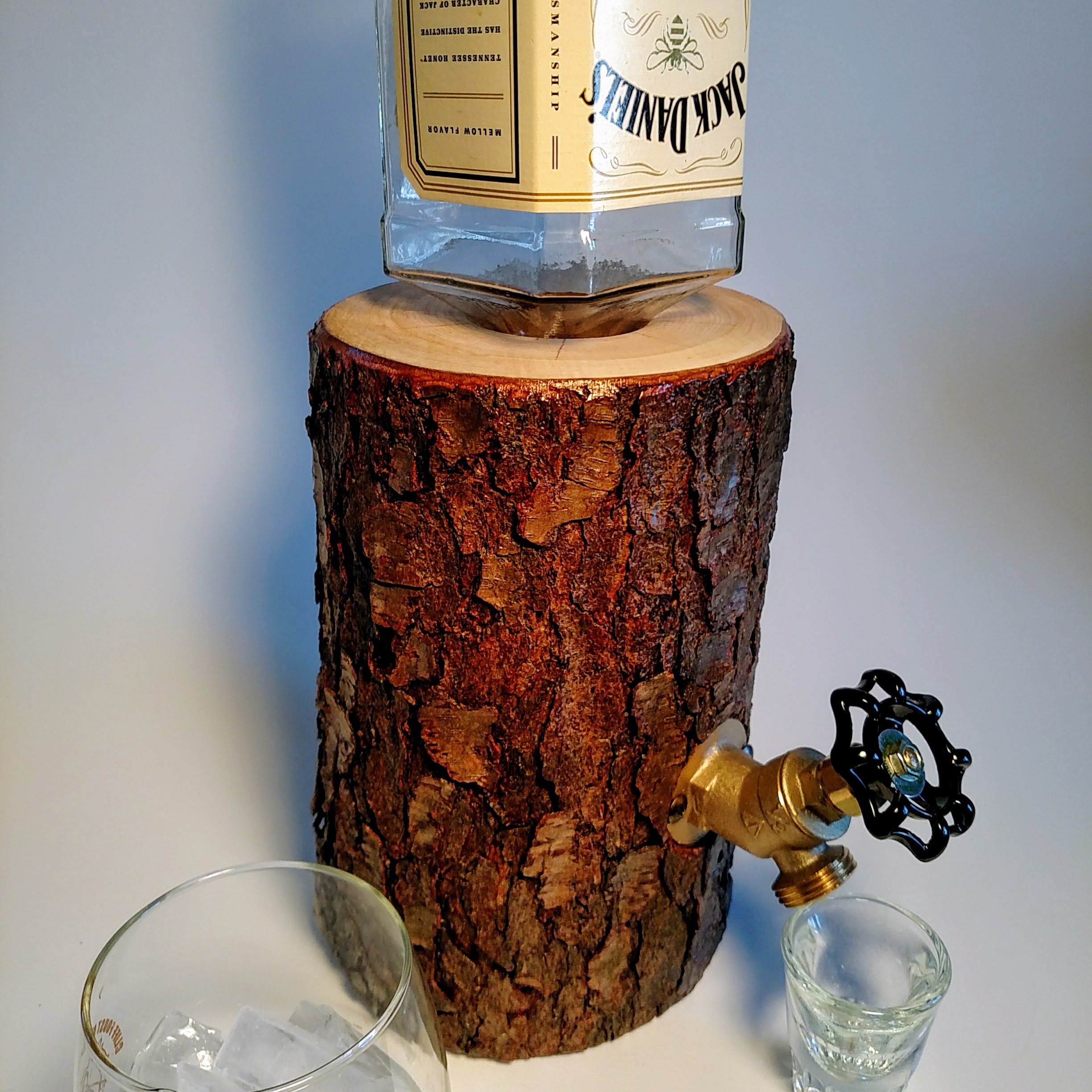 Unique Log Liquor Dispenser Get the party started with this unique