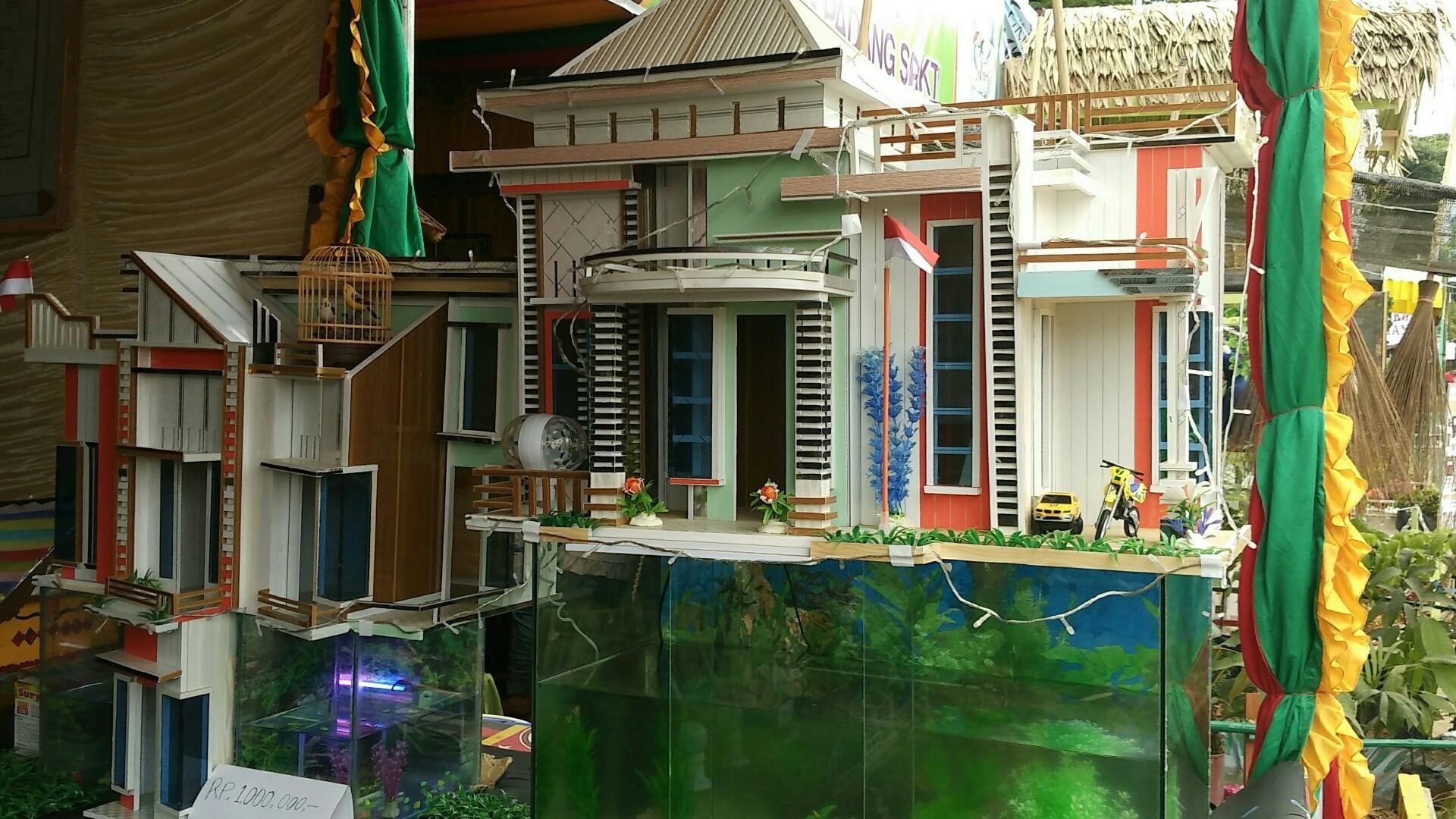 Karya seni anak bangsa Miniatur rumah mewah untuk aquarium ikan