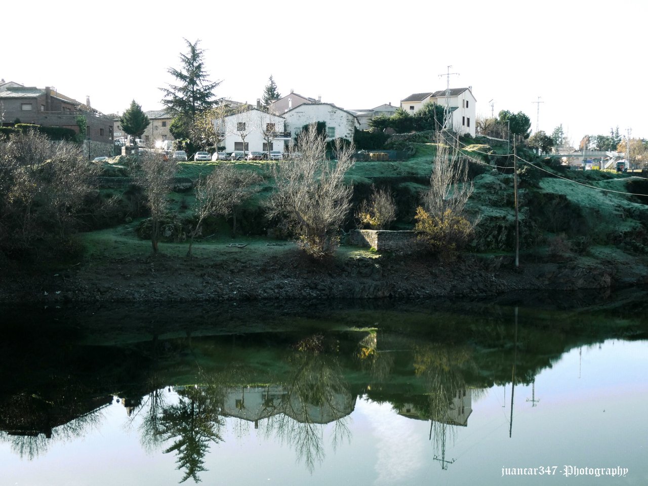Another mirage: the little houses on the banks of the Lozoya river