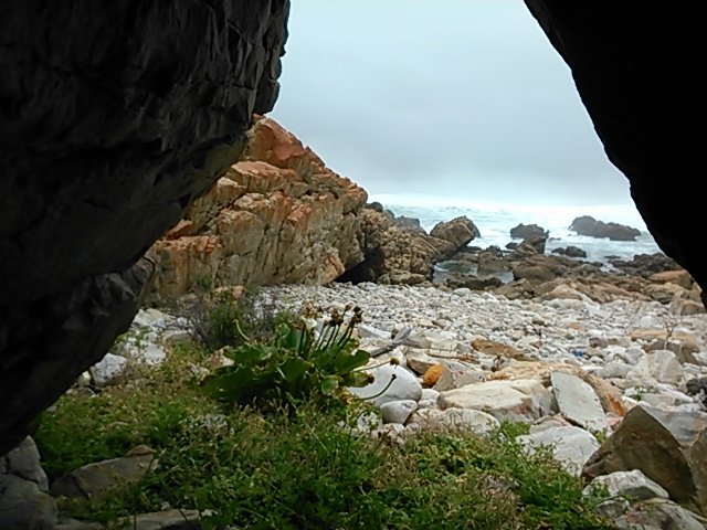 No need for a tent when there are caves on the African shoreline.