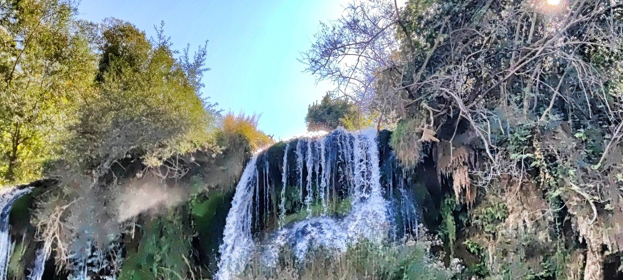 Water with the sun beyond