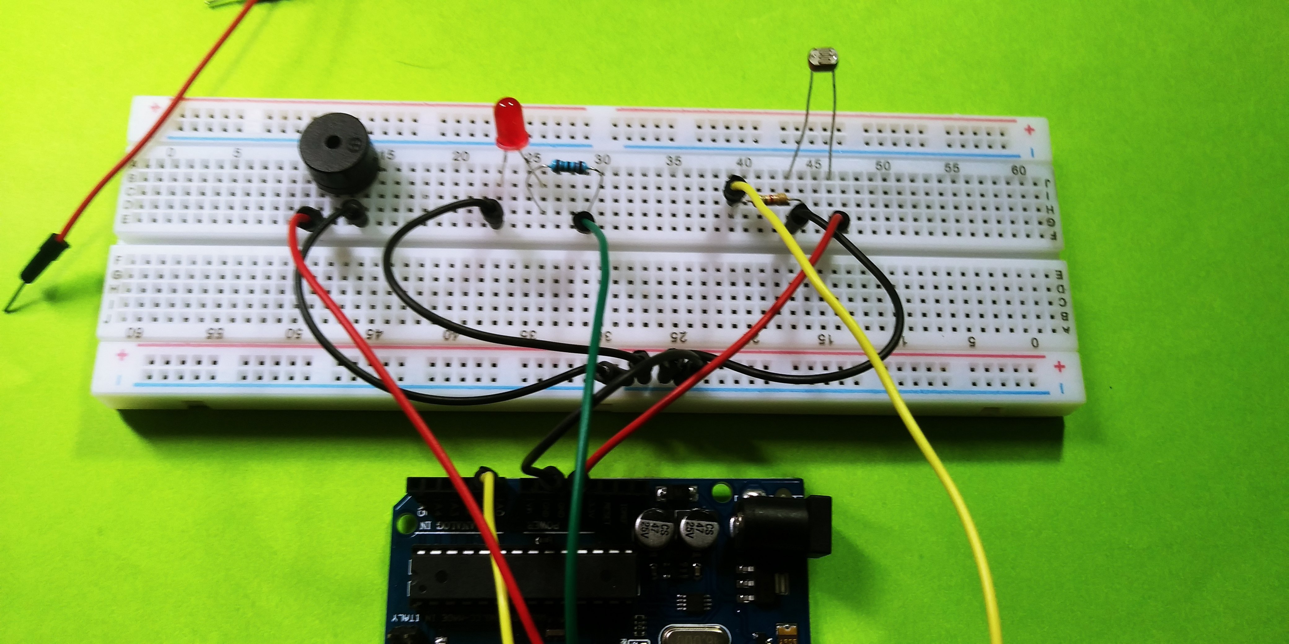 Active buzzer with LDR and LED- Arduino