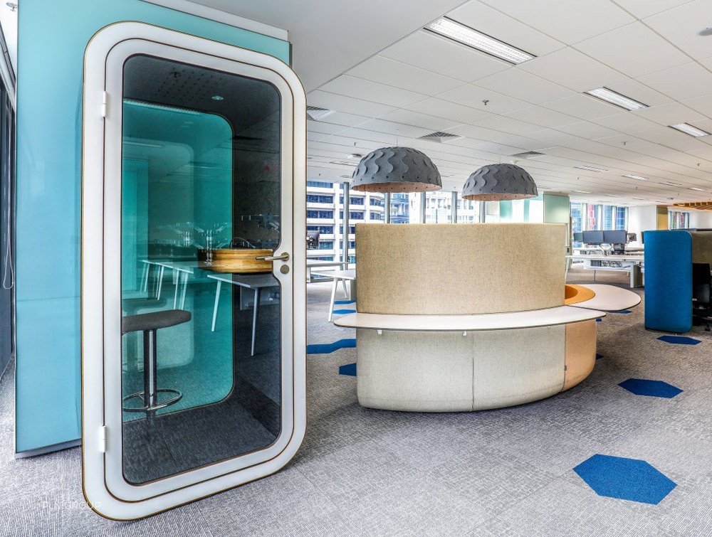 Framery-Smart-Office-Phone-Booth-with-Grey-Bar-Stool-and-Plywood-Table.jpg