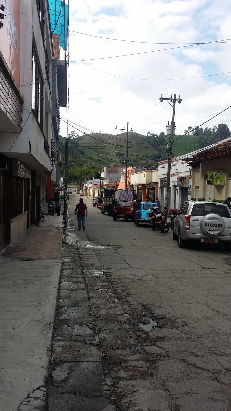 8 - I head to work down cobbled streets Libano Tolima always has mountain views no matter the direction.jpg