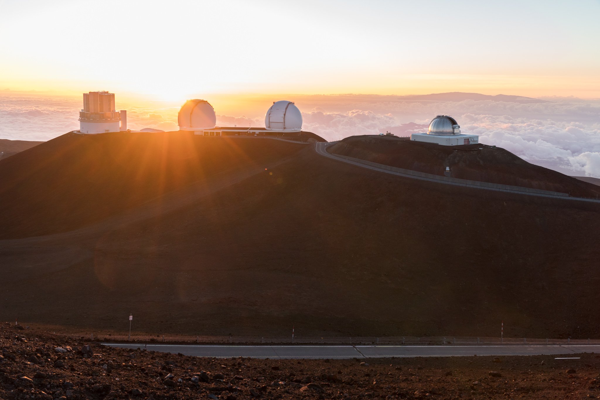 Mauna Kea sunset behind the observatories