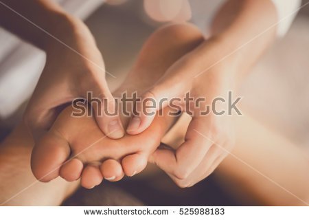 stock-photo-young-woman-having-feet-massage-in-beauty-salon-close-up-view-525988183 (1).jpg