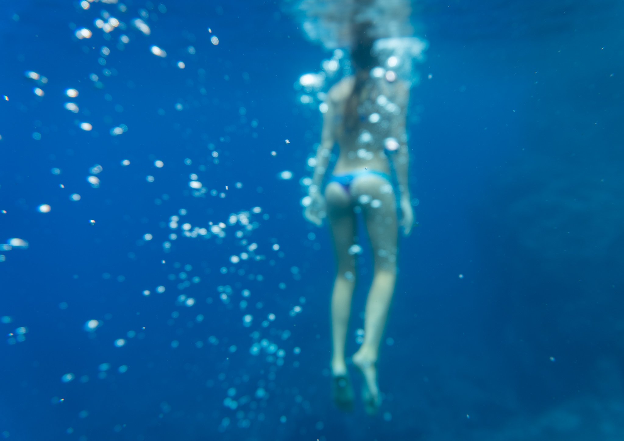 Tegan underwater after cliff jumping