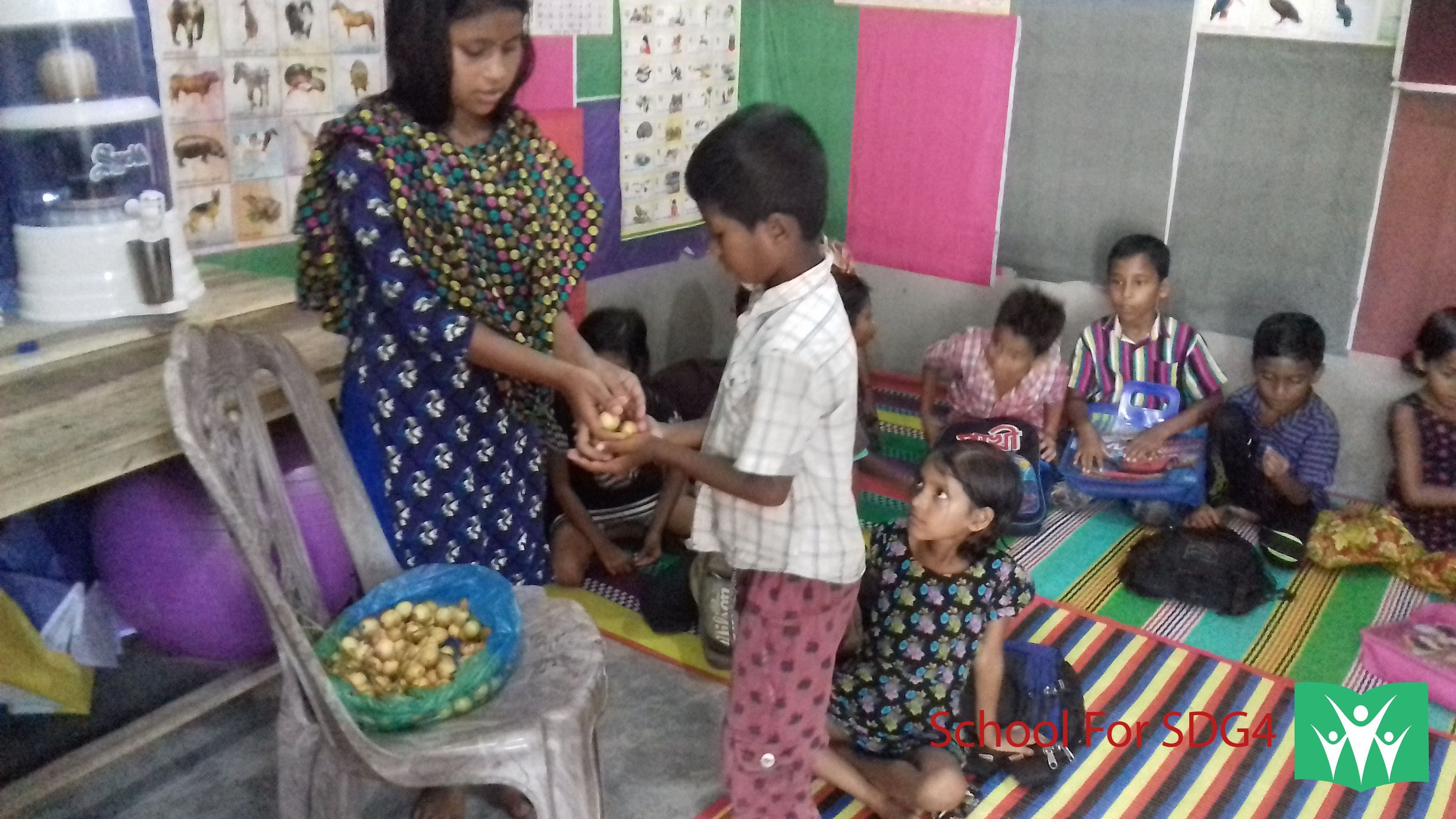 Emon Takes Fruit at home From School For SDG4.jpg