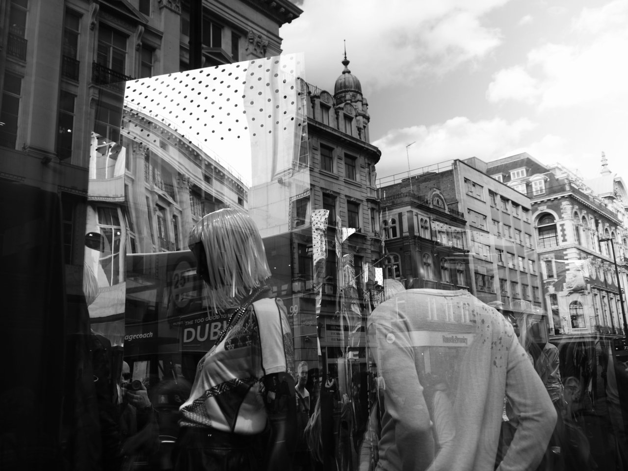 18843050342 - shop window with reflections oxford street bw.jpg