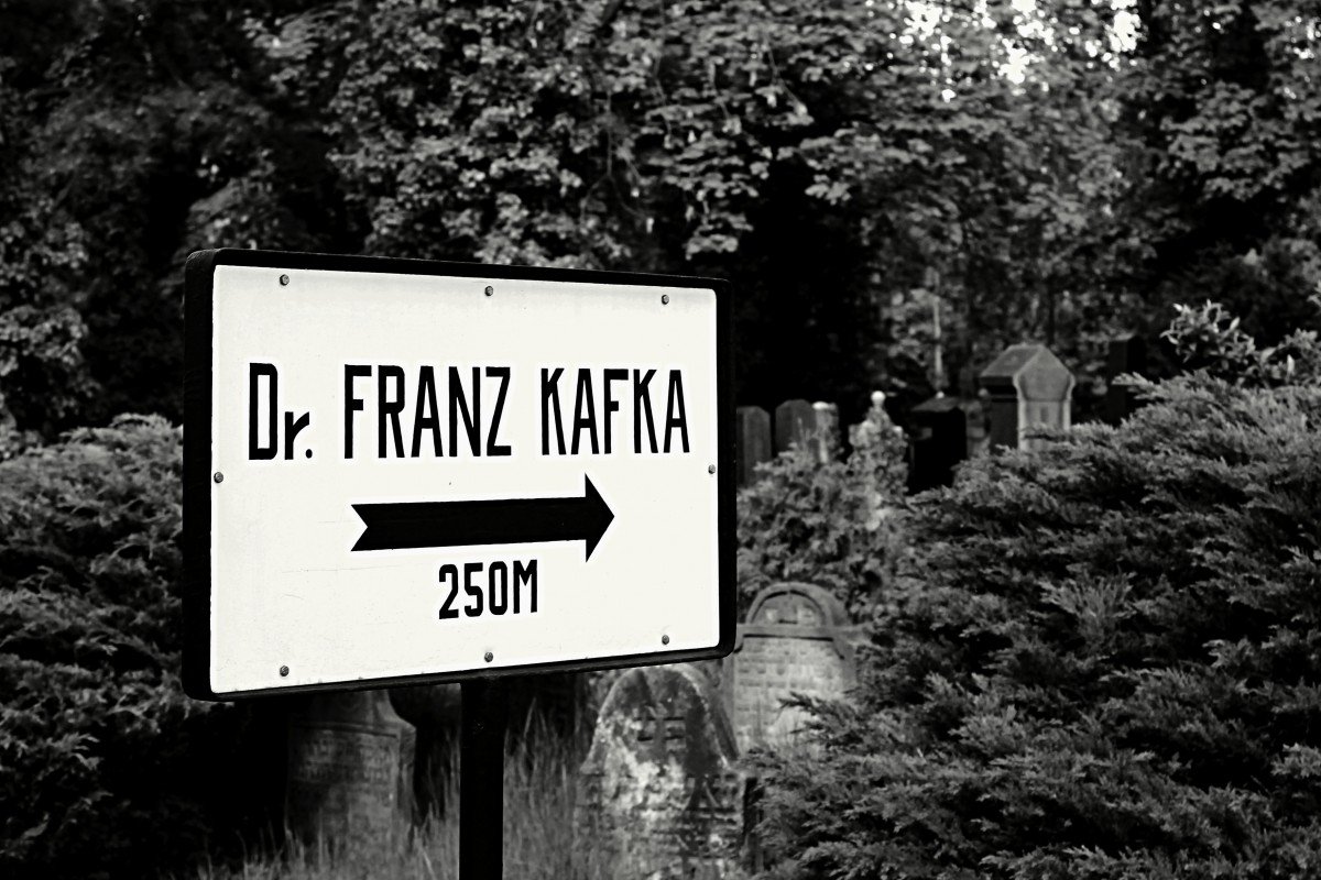 cemetery_signs_direction_kafka_writer_black_and_white-592628.jpg