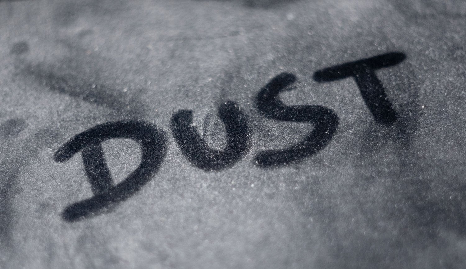 photo of dust on my retired TV console