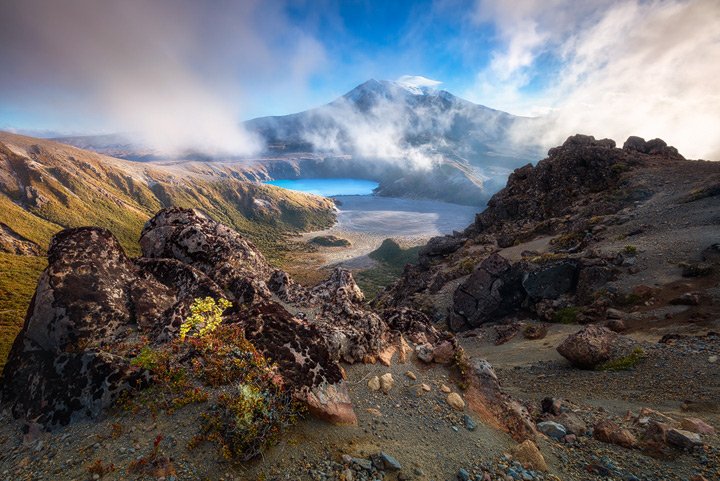 The blue lower Tama Lake beneath the mighty Mount Ruapehu
