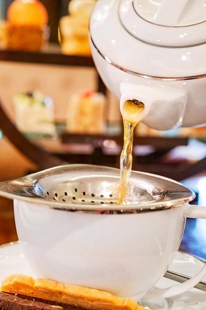 pouring tea from tea pot