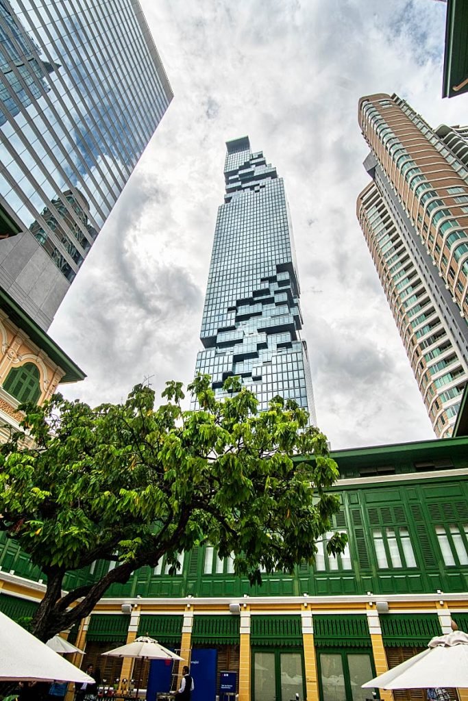 skyscrapers behind old building