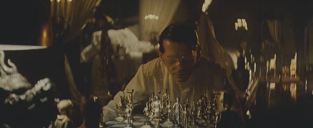 I noticed that in the teaser the kids were playing chess with some strange  chess pieces that originally appeared in the Blade Runner movie (from 1982,  could that be a time reference?).