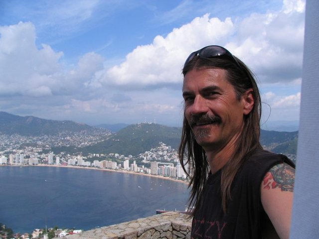 George and Acapulco skyline