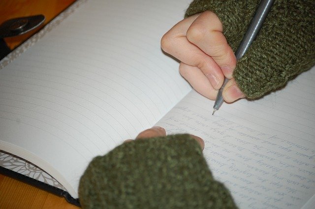 journal writing by girl
