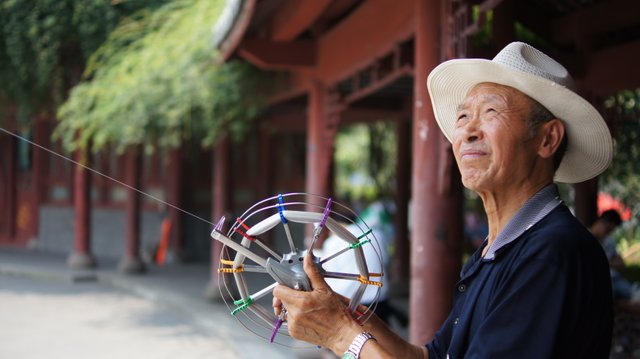 Man flying kite.