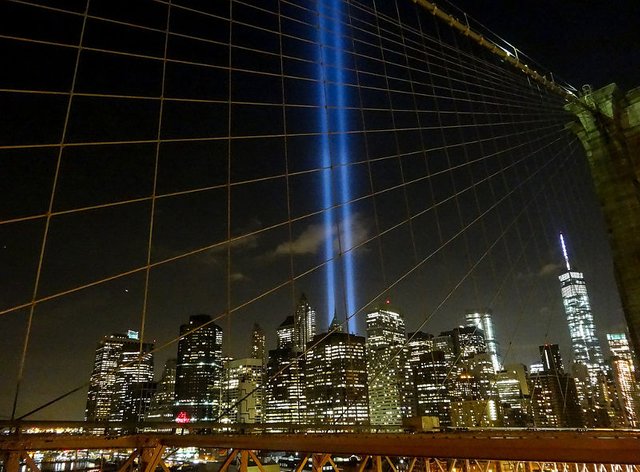 Remembering 9 11 New York sky lights view from Brooklyn Bridge GOSTRA.com